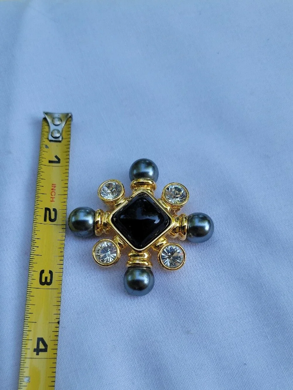 Vintage Joan Rivers Gold-Tone Brooch with Black Center, Gray  Clear Crystals